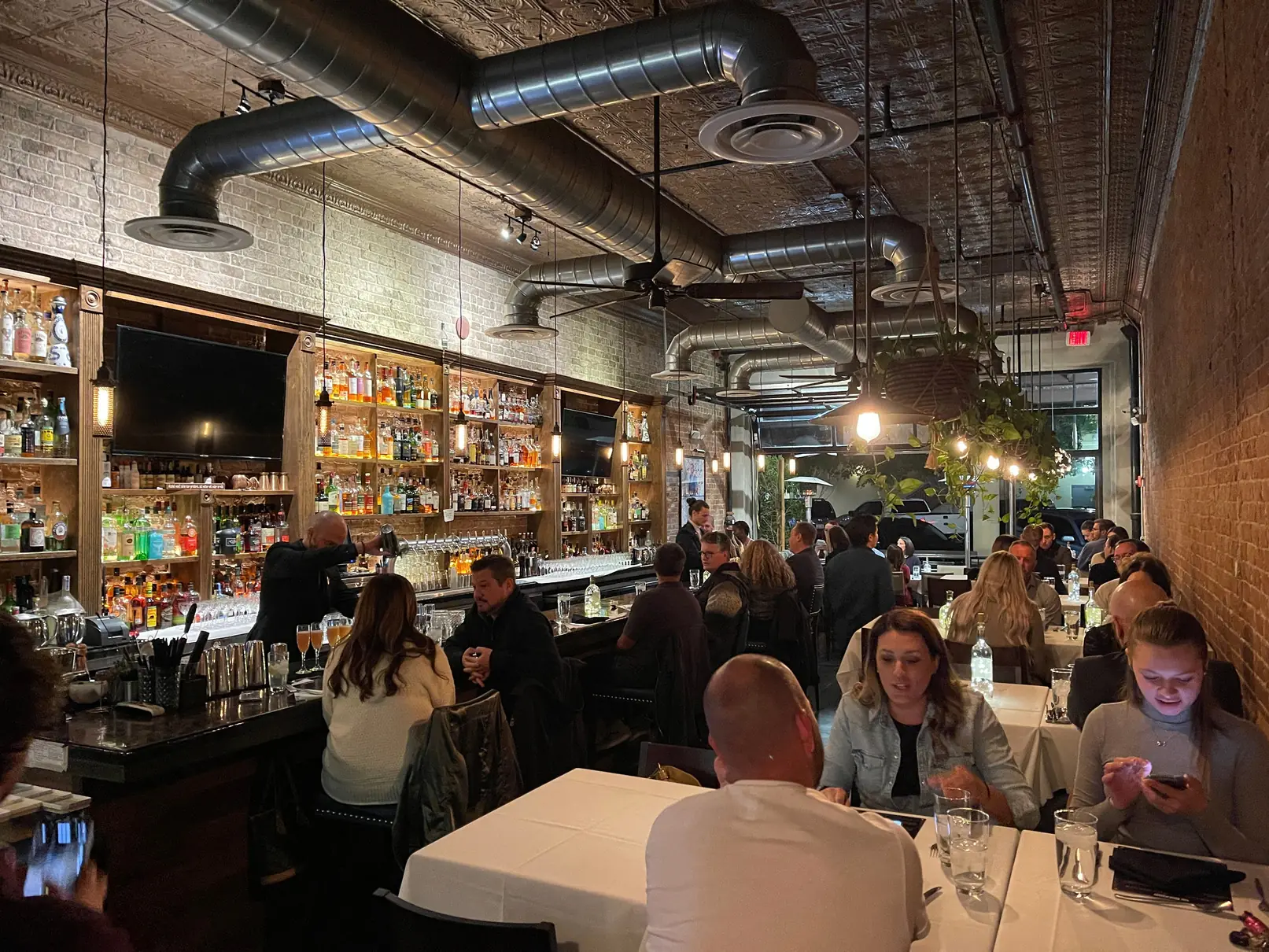 Guests dining inside The Brickyard Downtown